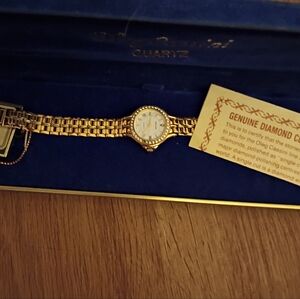 Oleg Cassini Gold And Genuine Diamond Ladies Watch